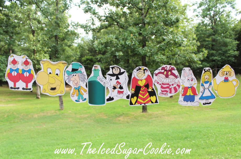 Free Alice In Wonderland Birthday Party Flag Bunting Hanging Banner by The Iced Sugar Cookie- Free Printables