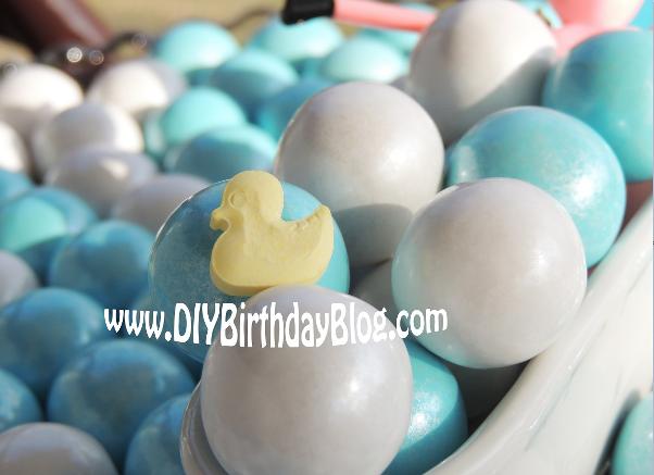 Piggy Bubble Bath Birthday Party- Free Birthday Party Printables- DIY Birthday Blog- Pig in Bathtub of Gumballs with Rubber Ducky Candy