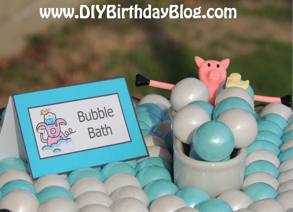 Piggy Bubble Bath Birthday Party- Free Birthday Party Printables- DIY Birthday Blog- Piggy Taking Bubble Bath in Gumballs in Bathtub